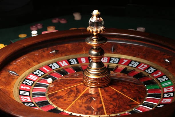 Paytable display showing Big Time Gaming symbol values and bonus trigger conditions
